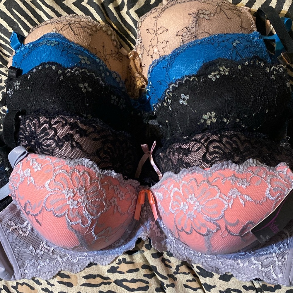 5 push-up bras some never worn. These are all size 38C